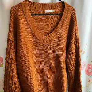 Burnt orange button up back sweater